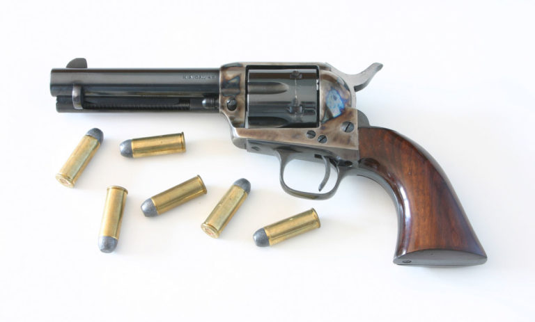 Colt 45 Peacemaker Revolver and cartridges