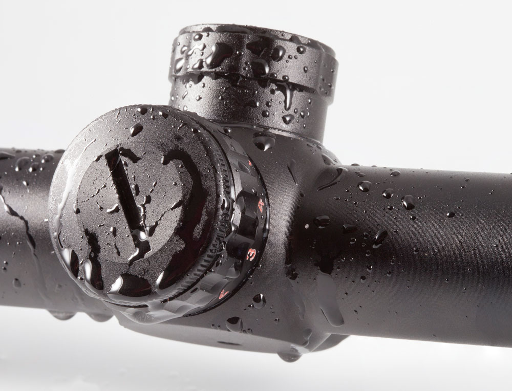 Rifle Scope wet with rain water droplets