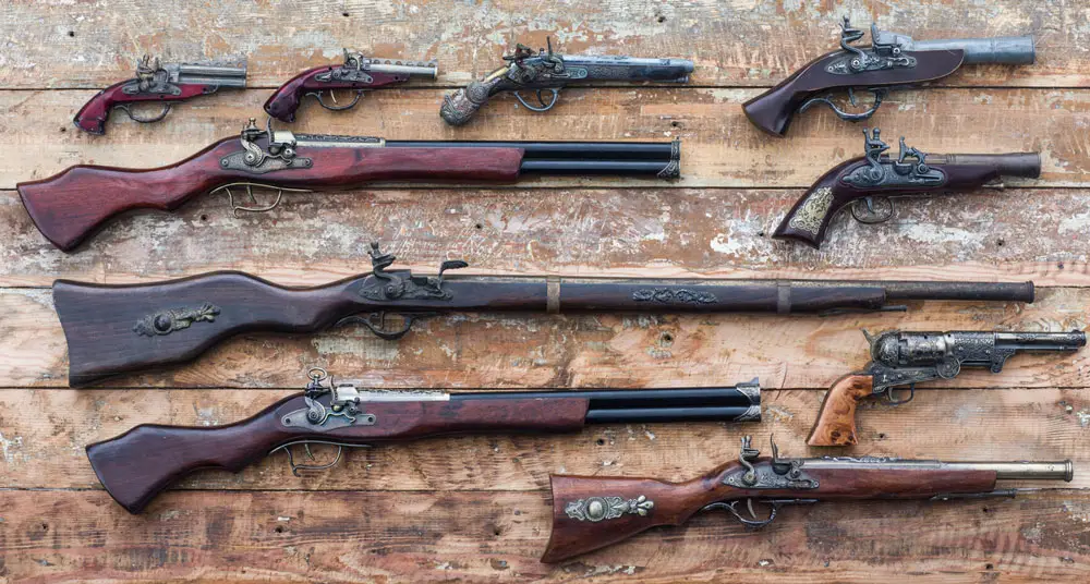 Wall of antique firearms