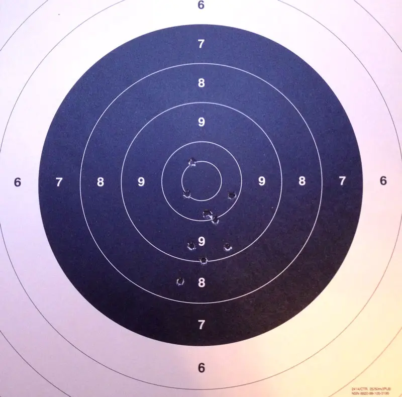 Holes on a paper target from .22lr bullets