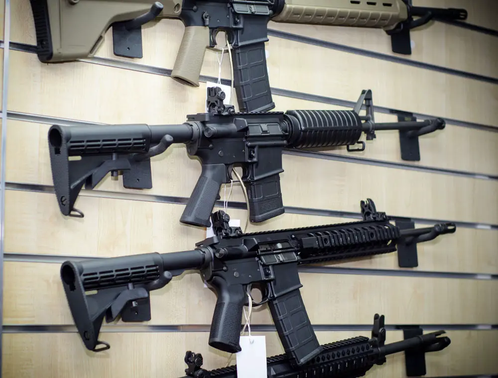 Wall of AR 15 Rifles in a gun store