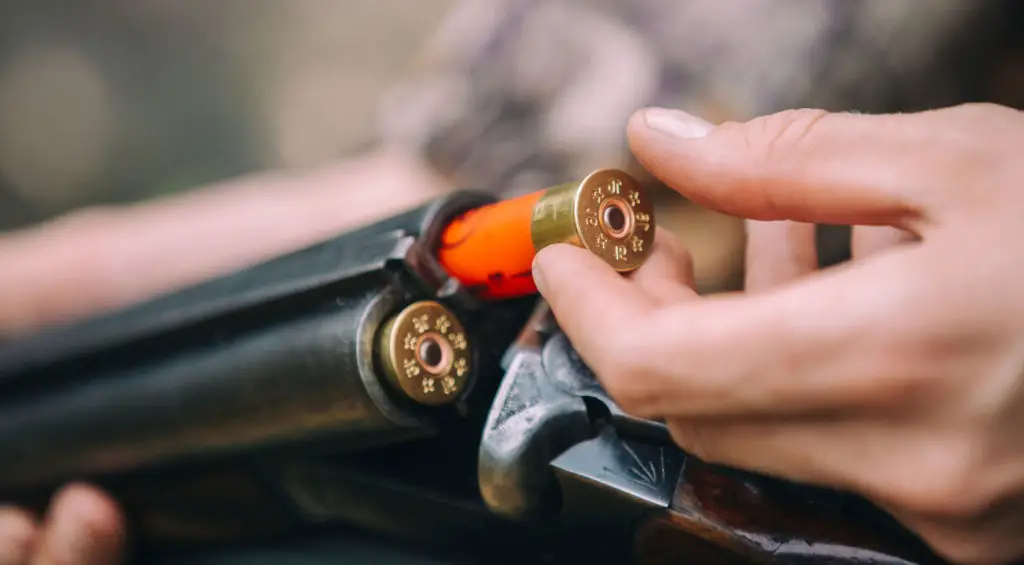 Loading a shotgun with a shell
