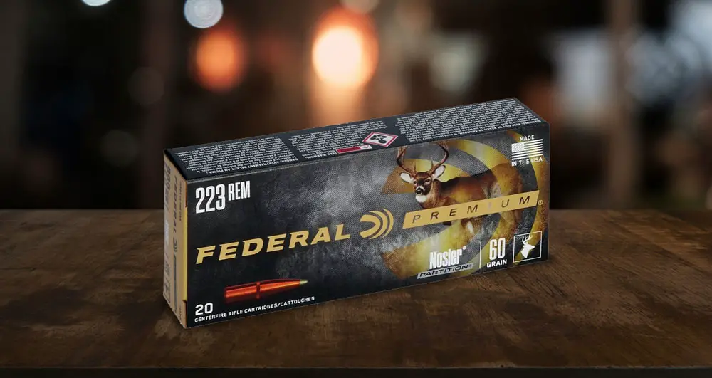 Federal Premium Nosler 223 Ammo Box on wood shelf