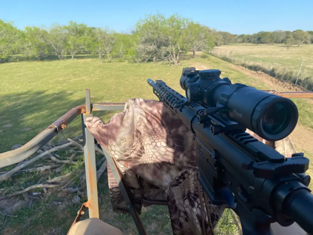 Sig Sauer Tango MSR scope mounted on rifle in stand