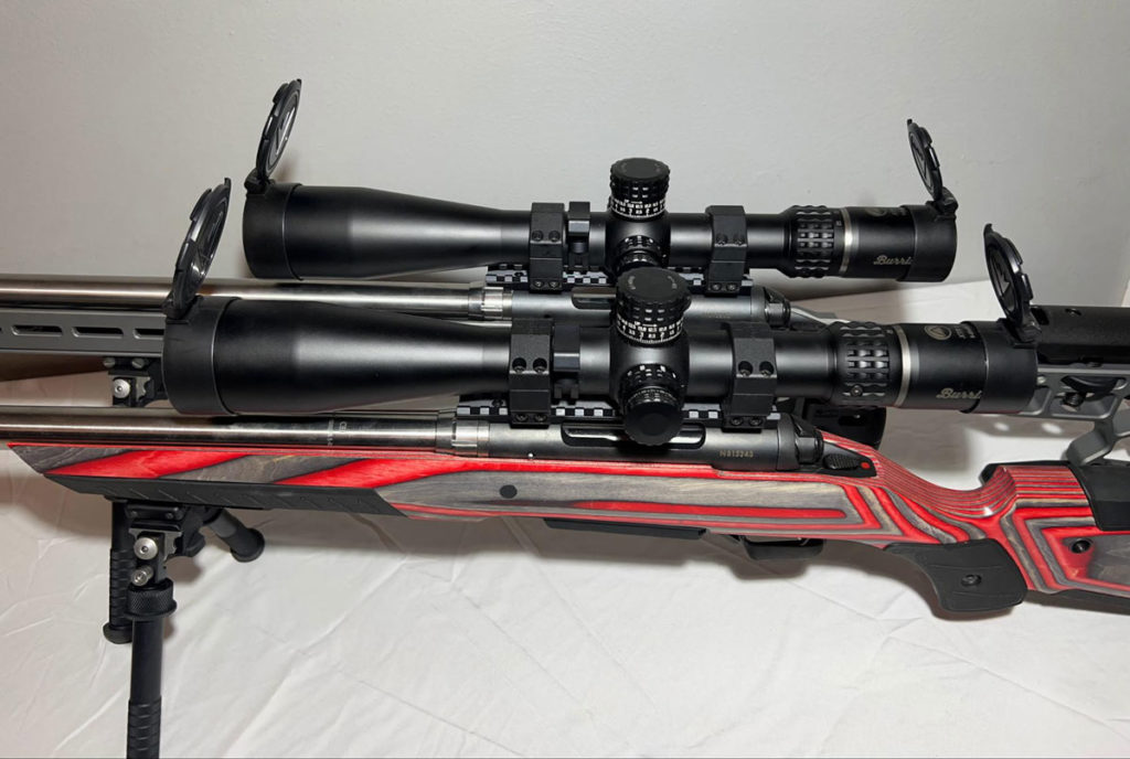 Two Burris XTR II 5-25X50 mounted on rifles
