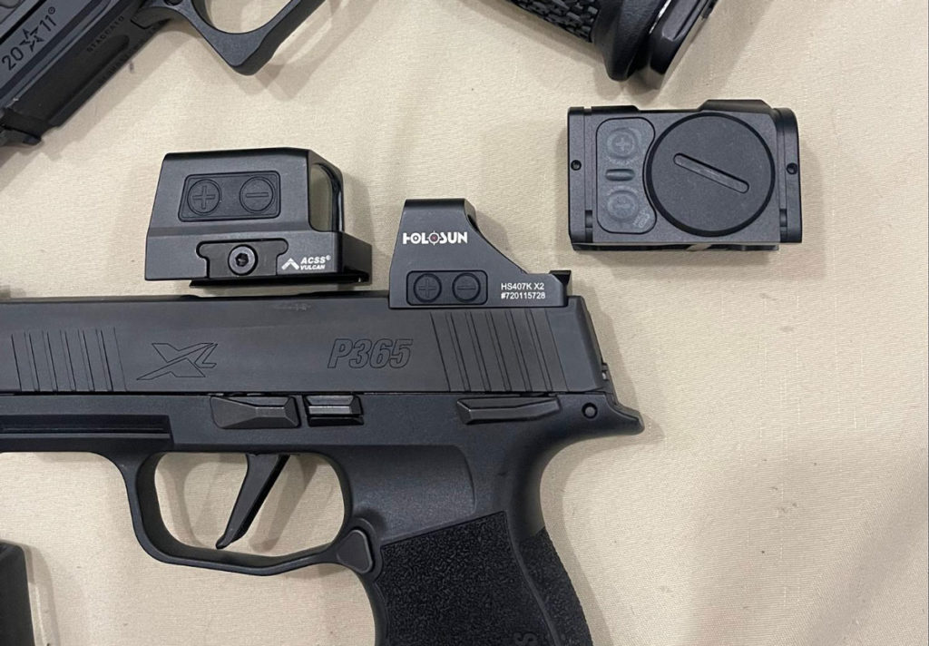 Holosun 407k Red Dot next to competitor similar red dot sights