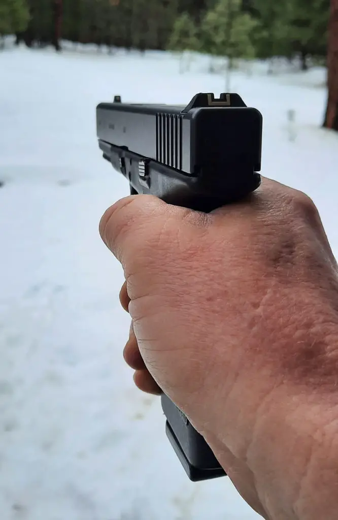 Firing the Glock 22 in a snowy field