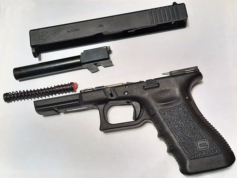 Glock 22 disassembled with all parts shown