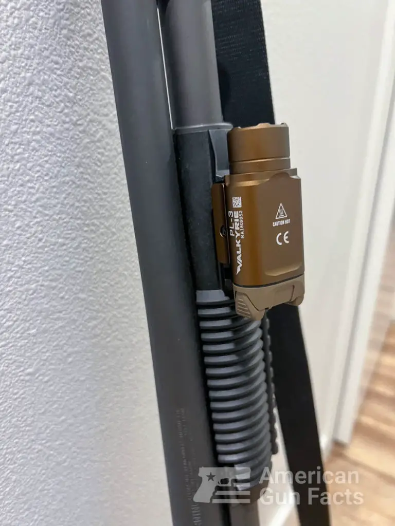 Olight mounted on a shotgun