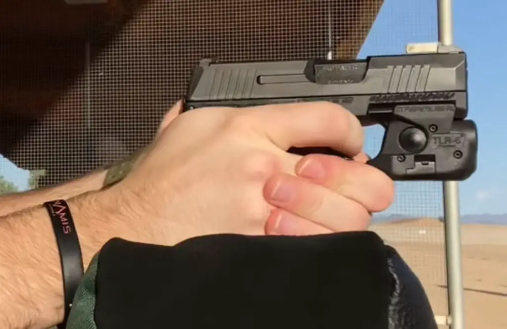 Accessory light mounted on the rail of the Sig P365