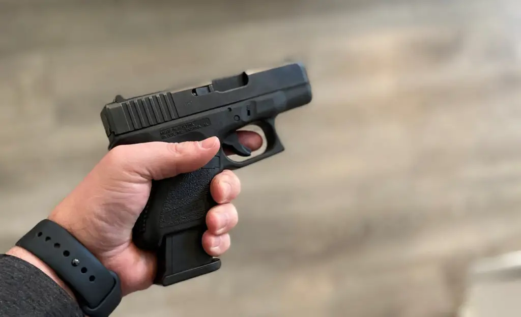 Glock 26 shown with a 15-Round G19 magazine inserted