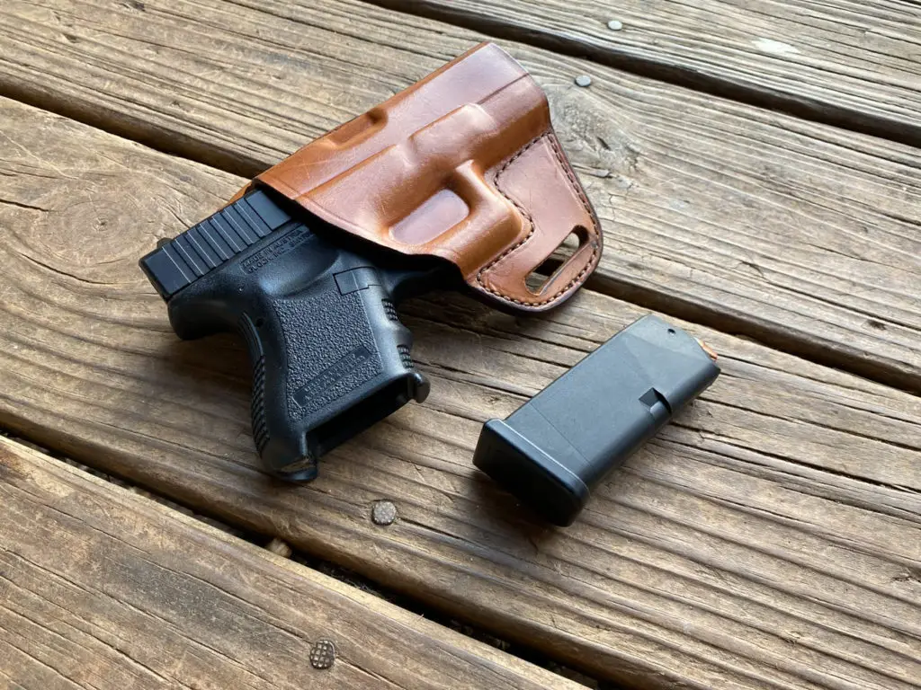 Glock 26 in holster with magazine