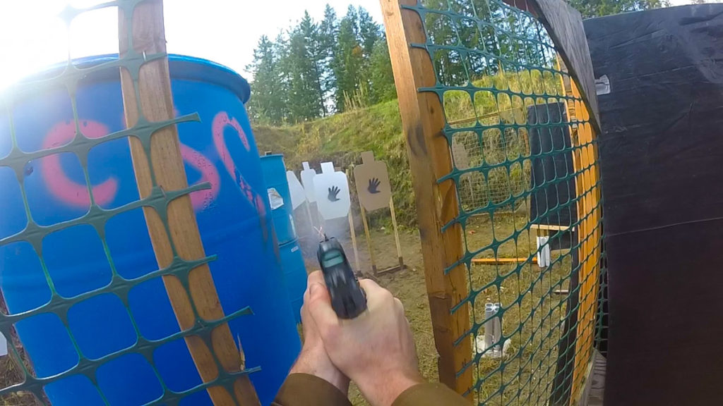 Shooting a pistol at a gun range with the Holosun 507c
