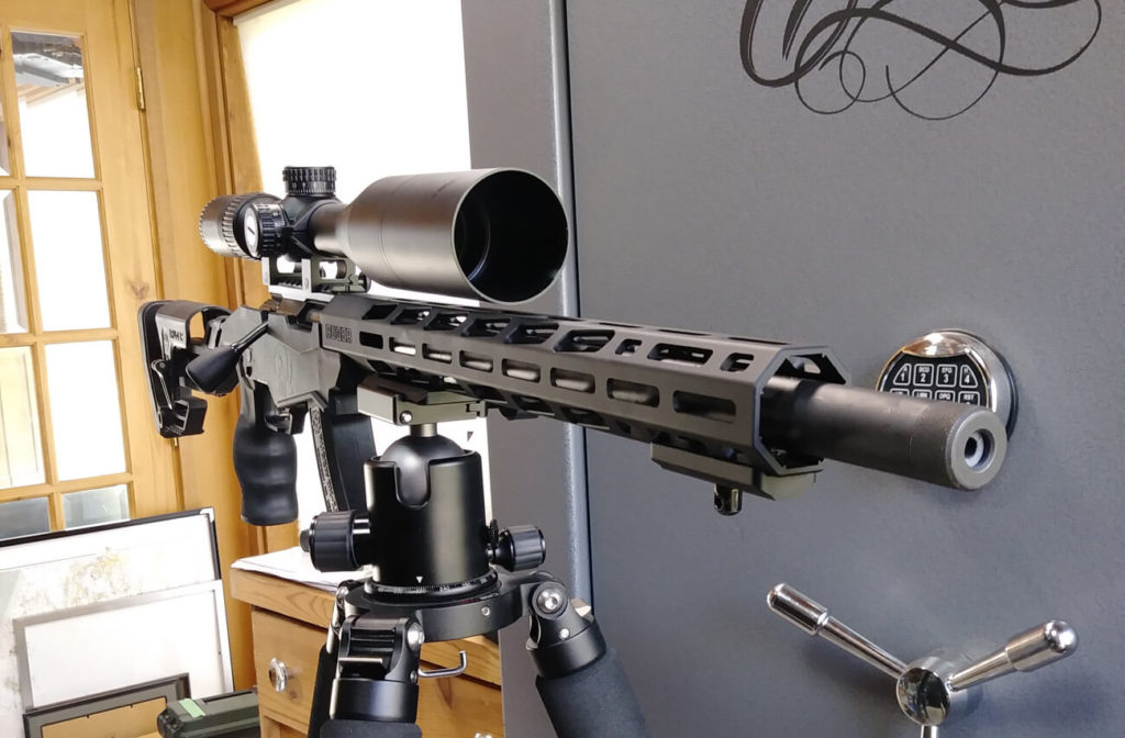Ruger Precision Rimfire Rifle mounted on a trip facing the viewer