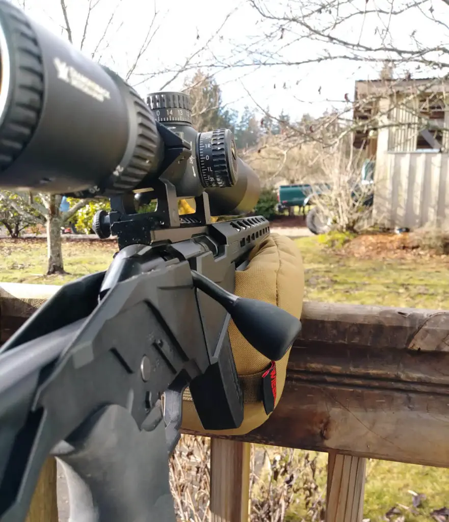 Scope base of a Ruger Precision Rimfire Rifle with a mounted long range scope on it