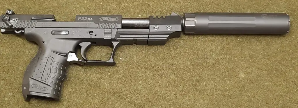 Walther P22 with a suppressor on it