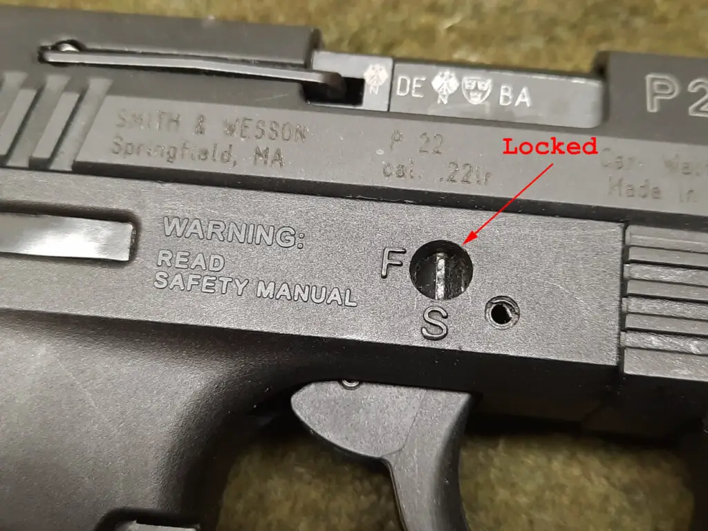 Trigger lock indicating "locked" on Walther P22