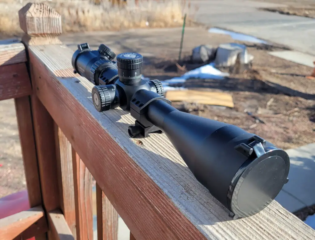 Athlon Argos Riflescope sitting outside on fence