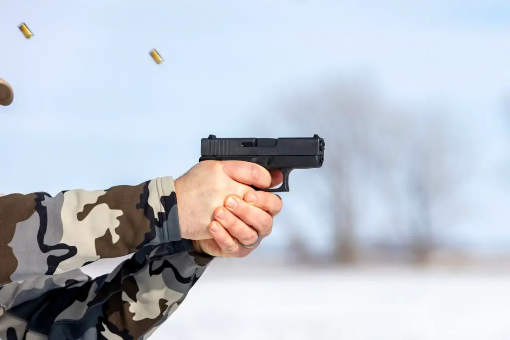 Glock 43 mid fire with casing flying out of the gun