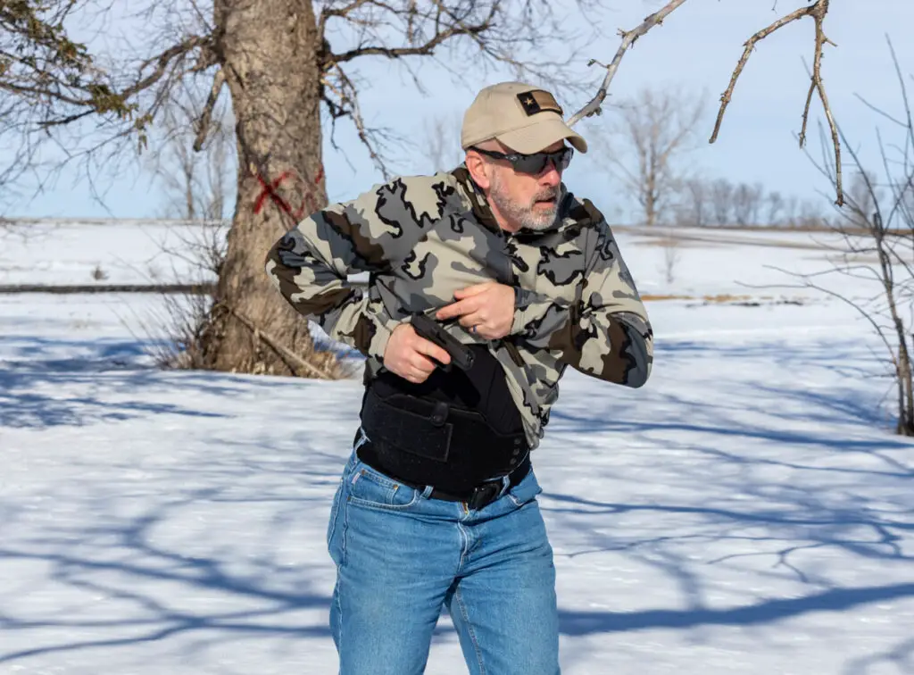 Man concealed carry Glock 43 pulls it out to shoot