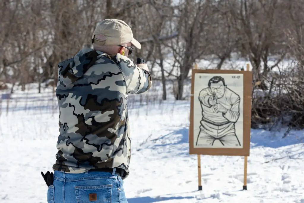 Man shooting Glock 43 at a target