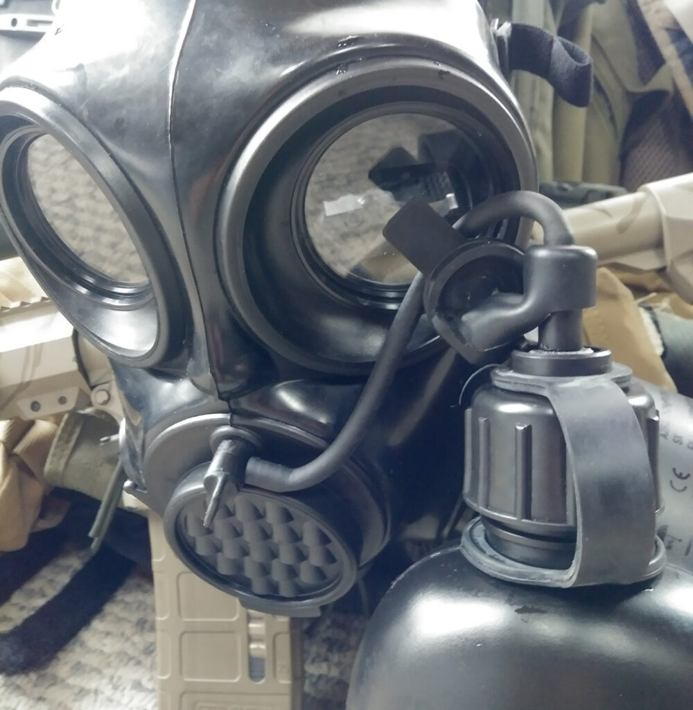 MIRA Safety gas mask includes a canteen and straw for drinking while wearing it