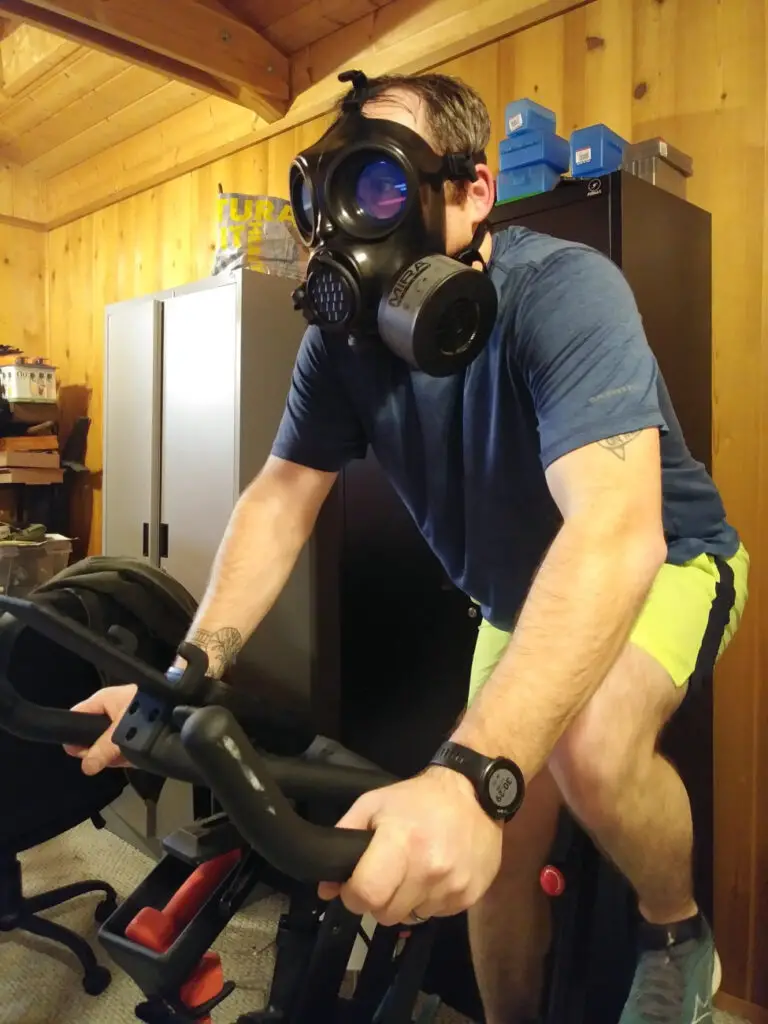 Stress testing the fogging of the MIRA Safety gas mask on a stationary exercise bike