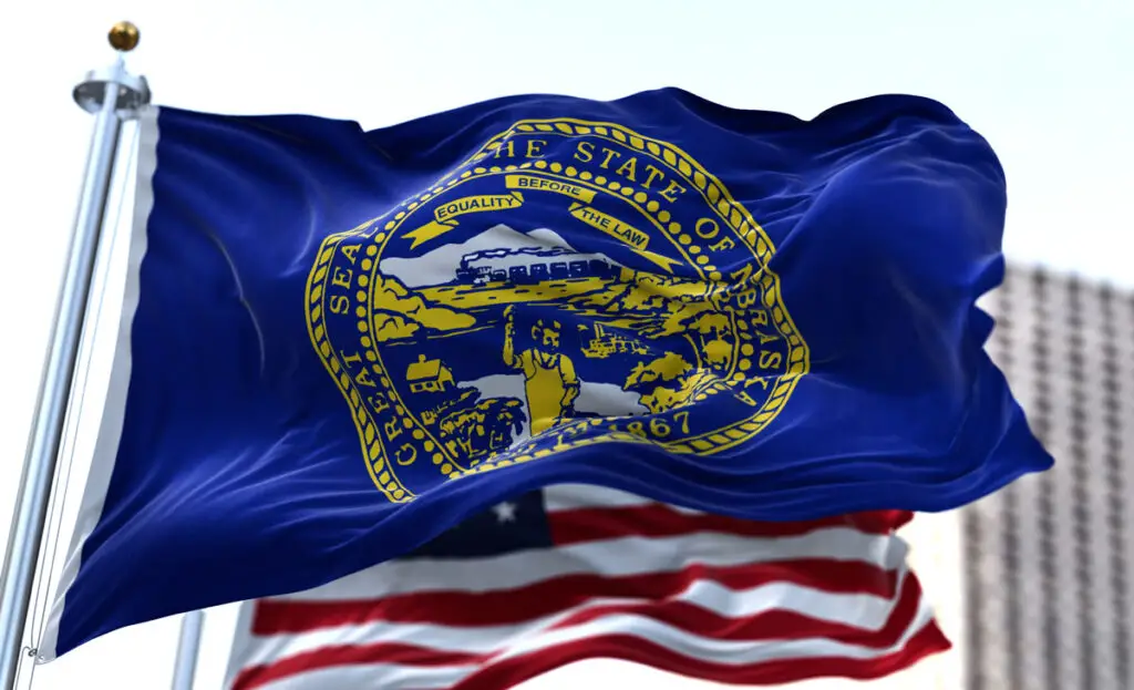 Nebraska Flag next to an American flag
