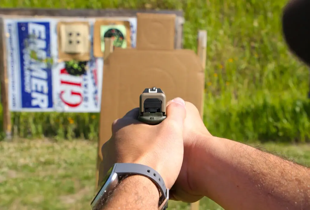 Back view shooting the Glock 19 pistol