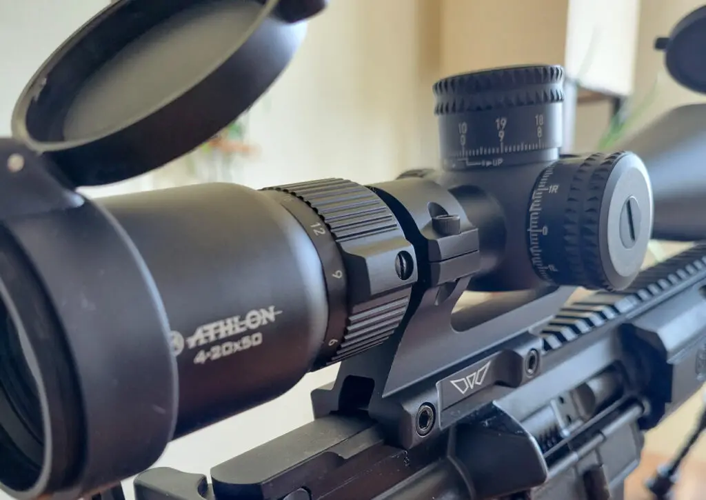 Athlon Heras scope with lens cap and mount