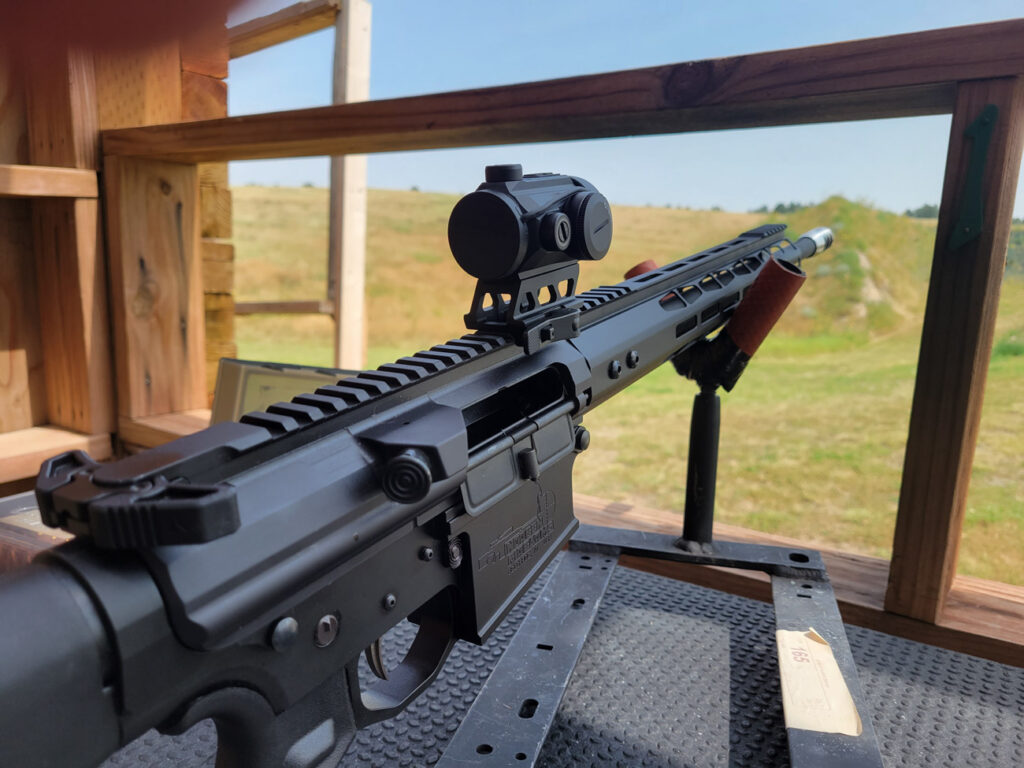 Primary Arms RD-25 Red Dot Site mounted on an AR-15 rifle at the range
