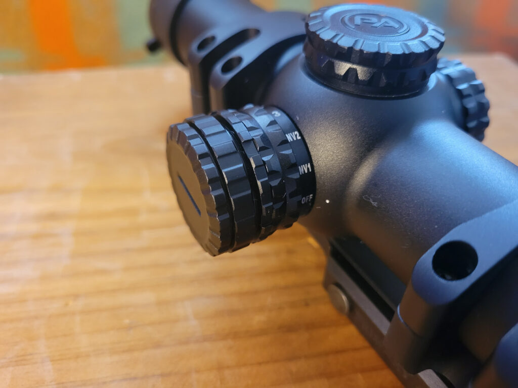 Primary Arms AutoLive Battery Cap installed mounted on scope