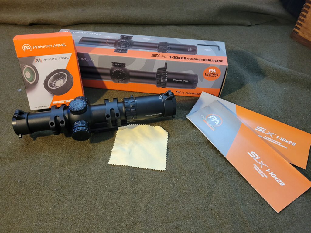 Primary Arms SLX 1-10x28 scope with boxes and autolive cap