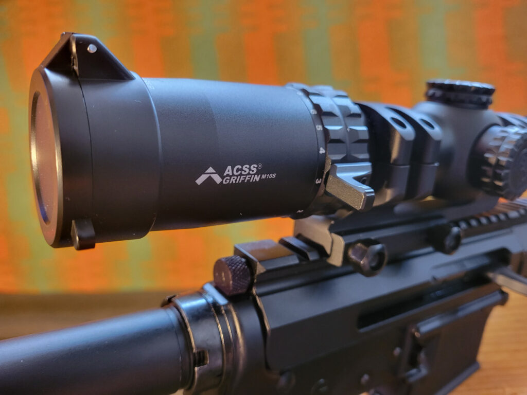 Primary Arms SLX 1-10x28 scope with lens cap and throw lever