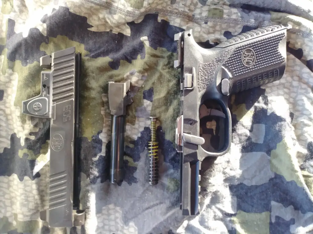 FN 509 breakdown with all pieces ready to clean