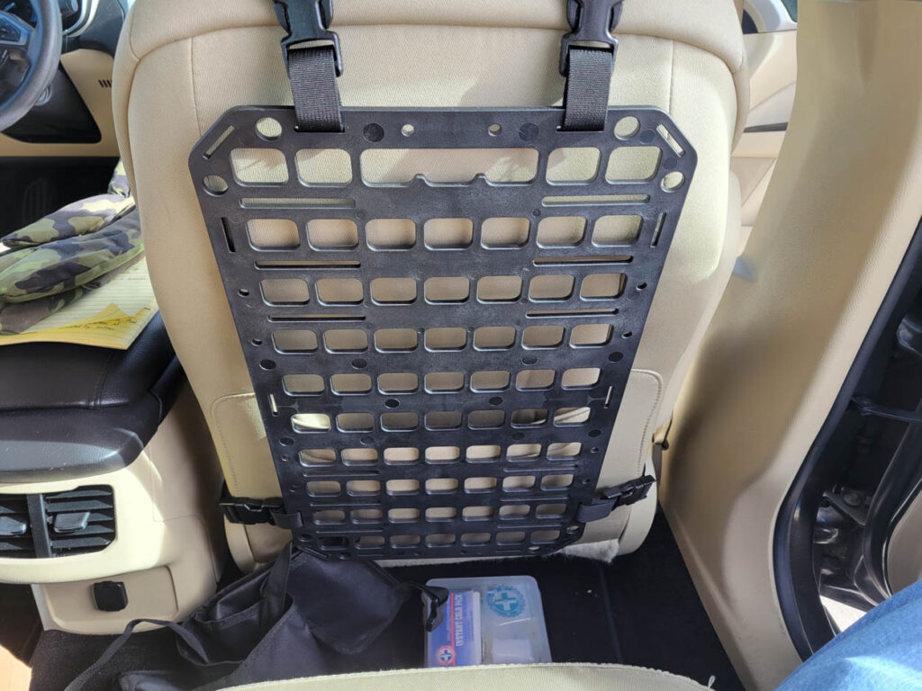 Plastic rack mounted on vehicle seat back